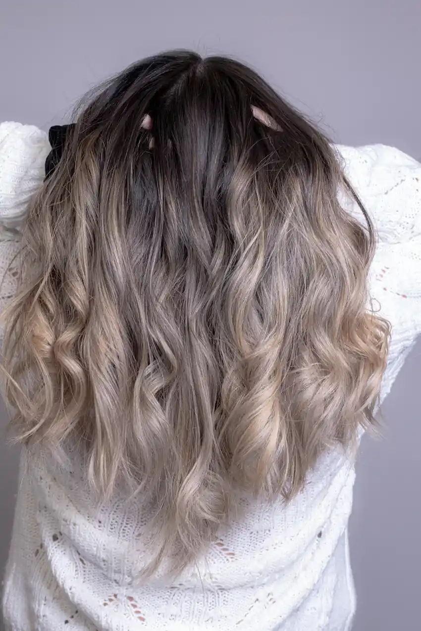 Long, lived-in blonde balayage waves